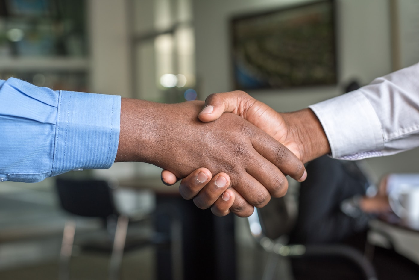 A practitioner welcoming a new client